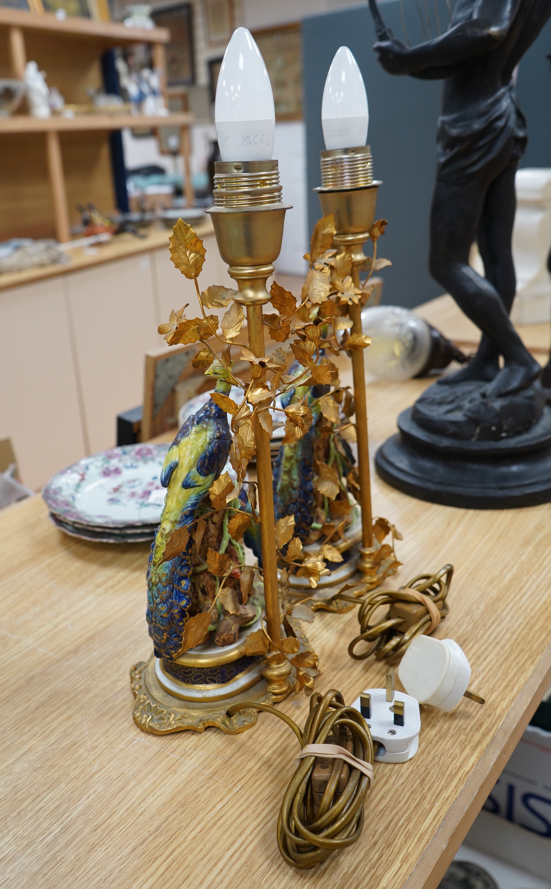 A pair of Sevres gilt metal and ceramic ‘pheasant’ table lamps, 38cm. Condition - good, not tested